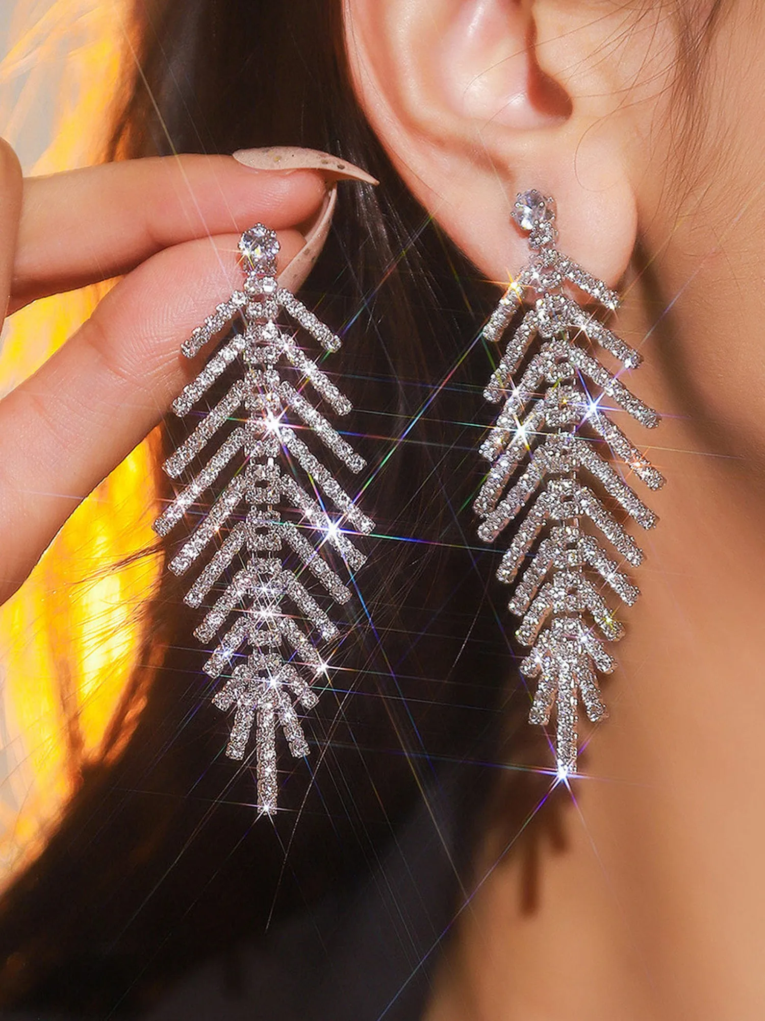 Boucles d'oreilles à pampilles et chaîne en forme de griffe