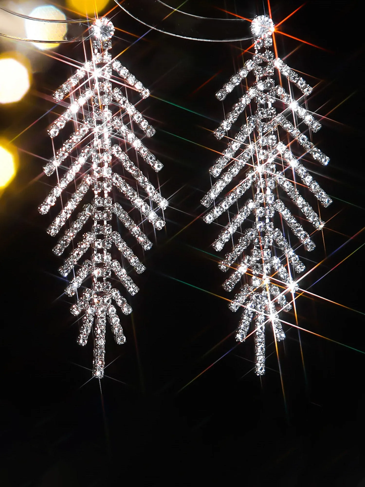 Boucles d'oreilles à pampilles et chaîne en forme de griffe